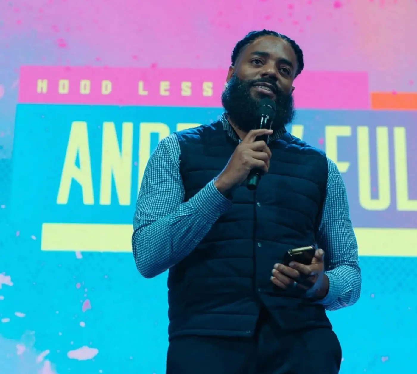 Andrew Fuller, founder of Street Lights, speaking with a microphone